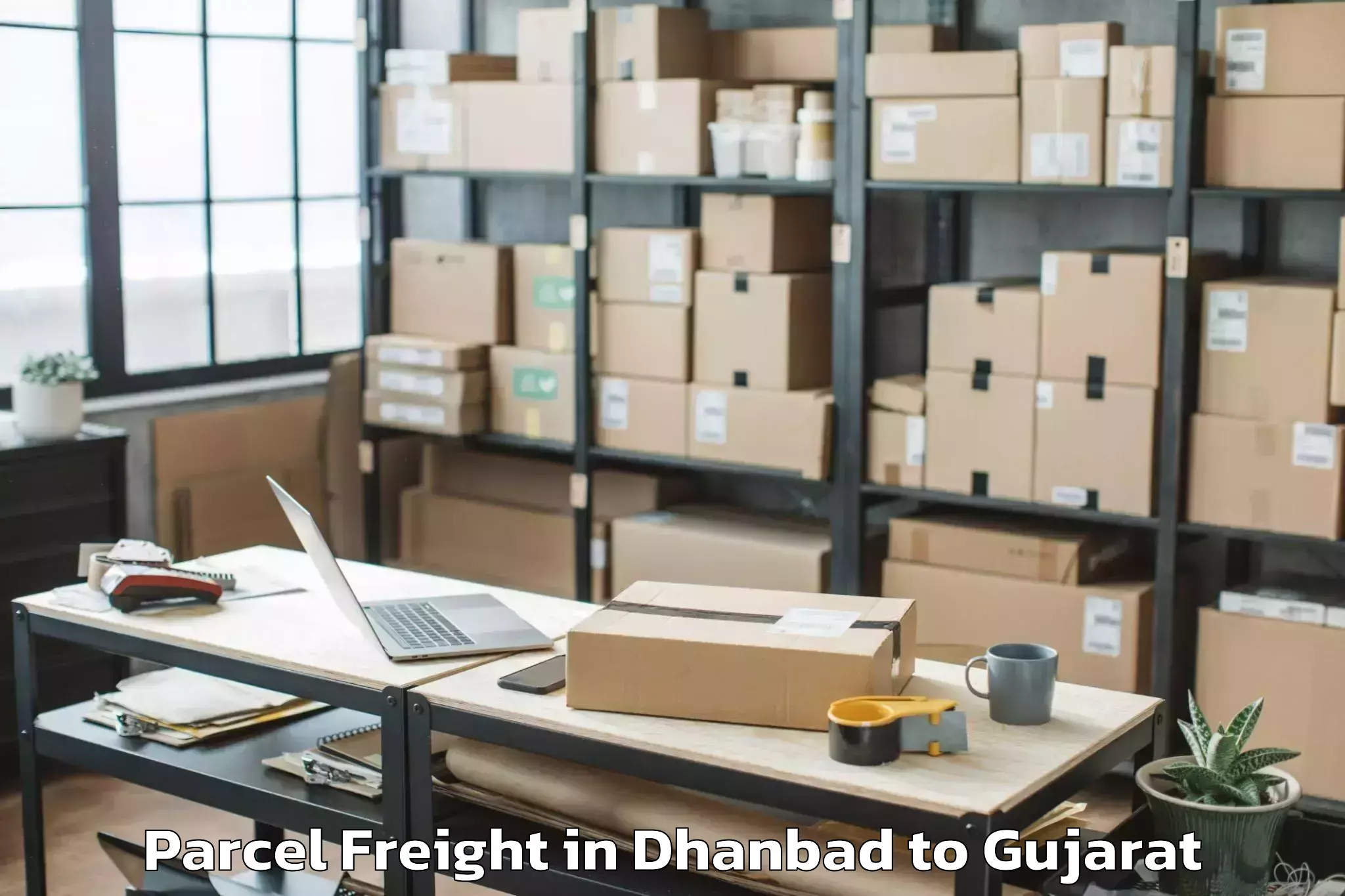 Book Dhanbad to Dediapada Parcel Freight